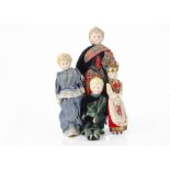 Four German bisque shoulder-head dolls with moulded hair, one with blue painted eyes and moulded