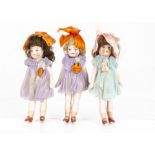 Three German all-bisque dolls house dolls 1930s, with blue painted eyes, two with brown and one with