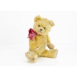'Squeeze' a German musical teddy bear 1930s, with light golden mohair, clear and black glass eyes
