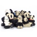 Various panda teddy bears, a 1930s British black and white wool plush unjointed panda nightdress