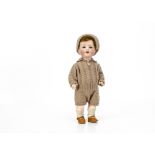 An Armand Marseille 996 toddler, with brown sleeping eyes, trembling tongue, brown mohair wig,
