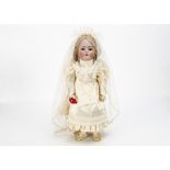 A Simon & Halbig 1078 child bride doll, with blue sleeping eyes, pierced ears, blonde nylon wig,