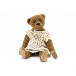 An unusual early German teddy bear circa 1910, similar to Bing with unusual brown wool plush,