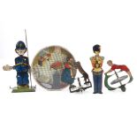 Tinplate novelty toys, a gyroscopic top with a heavy gauge painted tinplate girl dancing with