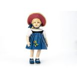 A Lenci pressed felt girl doll, with painted brown side glancing eyes, slight stern expressing,