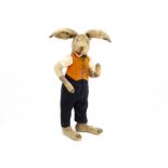 A rare large German dressed male rabbit 1920s, with clear and black glass eyes with white opaque