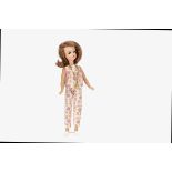 A Pedigree New Look Sindy circa 1968, with long side parted auburn hair, back of head stamped Made