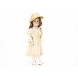 A Simon & Halbig 1079 walking child doll, with blue sleeping eyes, replace brown wig, composition