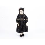An early French papier-mâché shoulder head doll, with fixed dark glass eyes, black painted pate with
