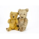 Two post-war Chiltern Hugmee teddy bears, one with blonde mohair, orange and black glass eyes, black