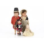 Four small dolls, a German all-bisque character baby with blue painted eyes, blonde painted hair,
