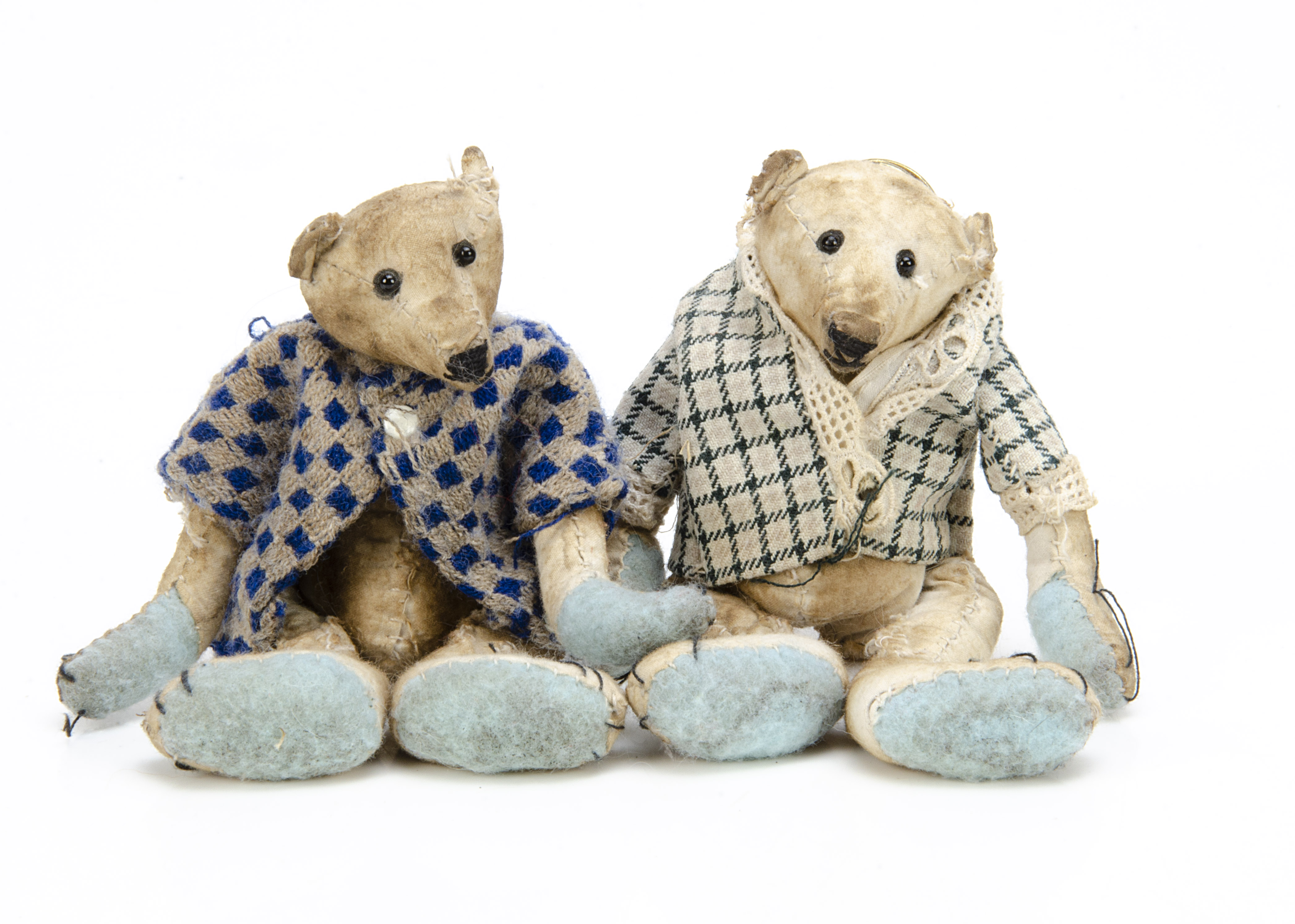 Two miniature artist teddy bears, both made from distressed white cotton, swivel heads and jointed