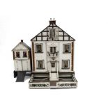 A G & J Lines No 25 Country Residence with Motor Garage dolls' house, with white painted and brick