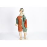 A German musical clown doll, with papier-mâché head and limbs, painted features, head rocking