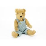 A good Chiltern-type teddy bear 1930s, with golden mohair, clear and black glass eyes with remains