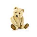 A Chiltern Ting-a-Ling teddy bear late 1950s, with unusual light golden mohair, orange and black