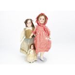 Three French bisque headed dolls, a S.F.B.J. 301 child doll with blue sleeping eyes, brown mohair