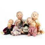 Composition dolls, three blonde haired baby dolls --19 ½in. (49.5cm.) height of largest (largest