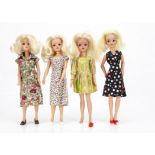 Four Pedigree centre-parted Sindy dolls, including a Lovely Lively Sindy; all with blonde hair and