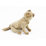 An early Steiff six-way jointed cat circa 1910, with white mohair, pale green and black glass