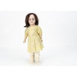 An Armand Marseille 1894 child doll, with blue sleeping eyes, brown mohair wig, jointed