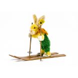 A rare Steiff pom-pom woollen skiing rabbit (Skihas 17) 1936-40, with brown and black glass eyes,