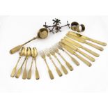 Unusual late 19th Century doll's cutlery, pale brass coloured metal with crossed hammer mark
