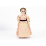 An Armand Marseille 1894 DEP child doll, with blue sleeping eyes, brown mohair wig, jointed
