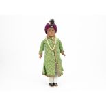 An Armand Marseille 370 Maharaja doll, with brown glass eyes, brown complexion, black mohair wig,