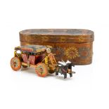An early Berchtesgarden carved and painted wooden horse drawn carriage, the elaborately decorated