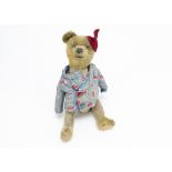 'Wee Willie' a 1920s dressed teddy bear, probably British with golden mohair head, hands and feet,