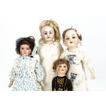 Three bisque headed dolls, a Simon & Halbig 1010 DEP shoulder head with blue sleeping eyes, blonde