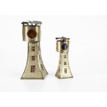 Two German tinplate lighthouse lanterns, gold spirit finish, coloured celluloid window panes, candle