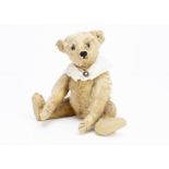 'Goldie' an early Steiff teddy bear with blank button circa 1905, with apricot golden mohair, boot