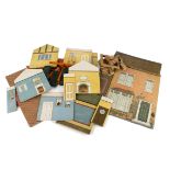 Collapsible printed cardboard dolls' houses, or parts from including a façade with green front