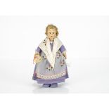 A Lenci Mascot Lucia Lombardia doll, pressed felt, brown side glancing eyes, blonde mohair wig,