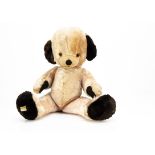 A rare large Merrythought Cheeky teddy bear late 1950s, with pink artificial silk plush, orange