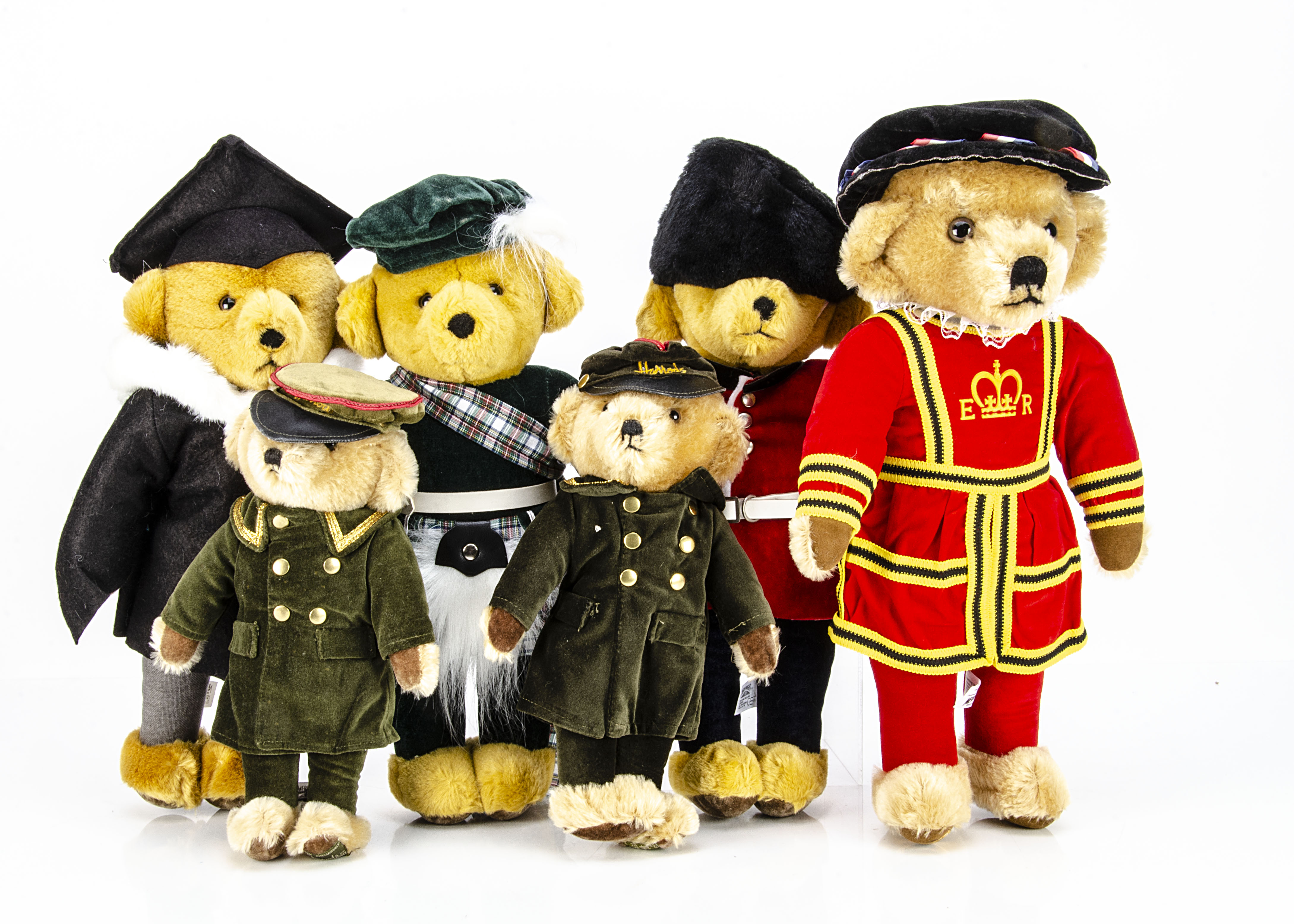 Six Merrythought standing character teddy bears, two Harrods doormen --12in. (30.5cm.) high; a Royal