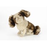 A fine and good quality 1930s Spaniel, with brown tipped and white mohair, clear and black glass