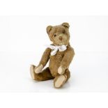 An Eduard Crämer teddy bear 1930s with light brown mohair, brown and black glass eyes, inset short