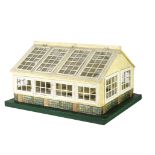 A Tri-ang wooden No 2 Greenhouse, painted cream with green base, tinplate and glass windows,
