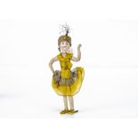 A German bisque headed Flapper Christmas cracker doll, with blue painted eyes, closed mouth, wisps