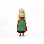A Kling 124 shoulder head doll, with blue sleeping eyes, blonde mohair wig, stuffed body with