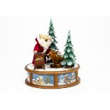 A Steiff limited edition Christmas musical box 2003, 249 of 1000 --10 ½in. (27cm.) high (missing box