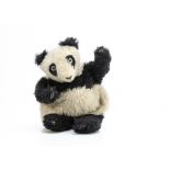 A British panda pyjamas case 1930/40s, with black and white wool plush, clear and black glass eyes