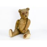 A large German teddy bear 1930s, with golden mohair, replaced eyes, pronounced muzzle, black