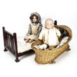 An Armand Marseille 370 shoulder head child doll, with Universal jointed body and floral printed