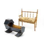 A French faux-bamboo doll's settle, with replaced wooden seat with cushion --16in. (40.5cm.) wide;