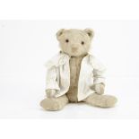 'Snow White' a white mohair 1930s teddy bear, with orange and black glass eyes, pronounced muzzle,