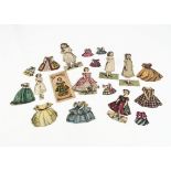 Late 19th Century paper dolls, a McLoughlin Bros Little Pet envelope and six dresses (no doll);